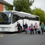 Group boarding an unbranded coach for a planned day trip in a UK town car park